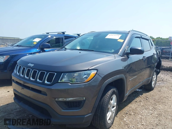 2018 Jeep Compass Sport with VIN 3C4NJDAB7JT235218, listed as a IAAI auction lot 42473771 with 106,302 mi miles and . Bid and sale history available at DreamBid. Image 2.