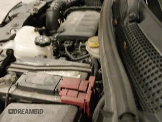 2014 Chevrolet Sonic RS with VIN 1G1JG6SB2E4209458, listed as a IAAI auction lot 41934332 with 244,011 mi miles and . Bid and sale history available at DreamBid. Image 19.