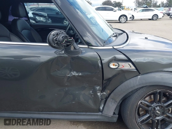 2012 MINI Convertible S with VIN WMWZP3C54CT250689, listed as a IAAI auction lot 41928624 with 126,442 mi miles and . Bid and sale history available at DreamBid. Image 12.