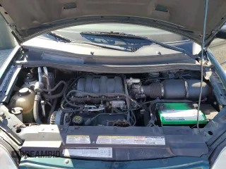 2000 Ford Windstar LX with VIN 2FMZA5149YBC10637, listed as a Copart auction lot 74140104 with 105,704 mi miles and Salvage Title. Bid and sale history available at carsss.com. Image 14.