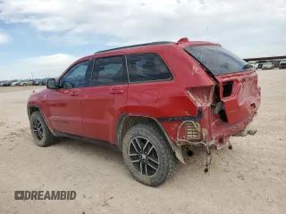 2018 Jeep Grand Cherokee Trailhawk with VIN 1C4RJFLGXJC477597, listed as a Copart auction lot 56338075 with 91,443 mi miles and Salvage title. Bid and sale history available at DreamBid. Image 2.