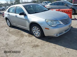2009 Chrysler Sebring LX *Ltd Avail* with VIN 1C3LC46B09N547231, listed as a IAAI auction lot 41453142 with 213,097 mi miles. Bid and sale history available at carsss.com. Image 1.