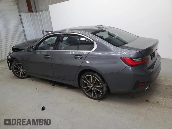 2019 BMW 3 Series 330i with VIN WBA5R1C56KFH04731, listed as a Copart auction lot 56854405 with 99,999 mi miles and Clean title. Bid and sale history available at DreamBid. Image 2.