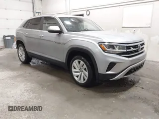 2023 Volkswagen Atlas SE with VIN 1V2KC2CA6PC210593, listed as a IAAI auction lot 41957633 with 34,801 mi miles and . Bid and sale history available at DreamBid. Image 1.