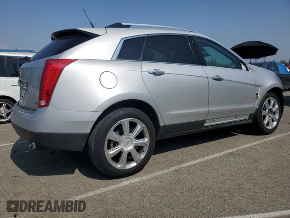 2013 Cadillac SRX Performance Collection z VIN 3GYFNDE38DS561321, wystawiony jako Copart lot #60237605 z przebiegiem 120 404 mil mil oraz Szkoda całkowita • Salvage title. Historia ofert i sprzedaży dostępna na DreamBid. Obrazek 3.