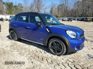 2016 MINI Countryman S with VIN WMWZC5C56GWP49473, listed as a Copart auction lot 50752355 with 118,060 mi miles and Salvage Title. Bid and sale history available at DreamBid. Image 4.