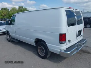 2009 Ford Econoline Cargo Commercial with VIN 1FTNE14W29DA58533, listed as a IAAI auction lot 42083708 with 42,235 mi miles and . Bid and sale history available at DreamBid. Image 3.
