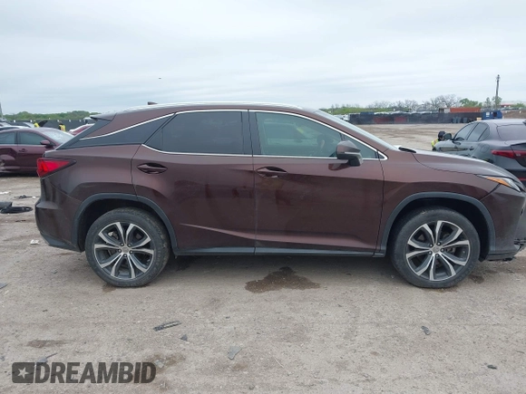2016 Lexus RX 350 z VIN 2T2ZZMCA5GC029529, wystawiony jako IAAI lot #41953567 z przebiegiem 133 460 mil mil oraz . Historia ofert i sprzedaży dostępna na DreamBid. Obrazek 13.