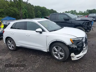 2020 Audi Q3 S line Premium with VIN WA1DECF30L1115390, listed as a IAAI auction lot 42503728 with 18,556 mi miles and . Bid and sale history available at DreamBid. Image 13.