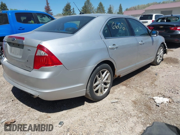 2012 Ford Fusion SEL z VIN 3FAHP0JGXCR422667, wystawiony jako IAAI lot #42226602 z przebiegiem 181 237 mil mil oraz . Historia ofert i sprzedaży dostępna na DreamBid. Obrazek 4.
