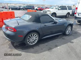 2018 FIAT 124 Spider Classica z VIN JC1NFAEK3J0137856, wystawiony jako IAAI lot #41959793 z przebiegiem 49 513 mil mil oraz . Historia ofert i sprzedaży dostępna na DreamBid. Obrazek 4.