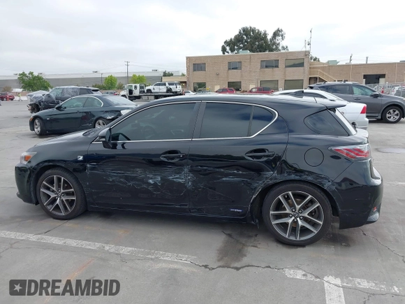 2015 Lexus CT 200h z VIN JTHKD5BH6F2239559, wystawiony jako IAAI lot #42163152 z przebiegiem 199 342 mil mil oraz . Historia ofert i sprzedaży dostępna na DreamBid. Obrazek 14.