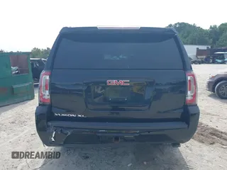 2019 GMC Yukon XL SLT with VIN 1GKS2GKCXKR359166, listed as a IAAI auction lot 40546837 with Not provided miles and . Bid and sale history available at DreamBid. Image 16.