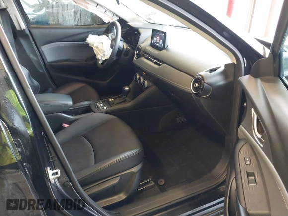 2019 Mazda CX-3 Touring z VIN JM1DKDC70K0404219, wystawiony jako IAAI lot #42148454 z przebiegiem 80 539 mil mil oraz . Historia ofert i sprzedaży dostępna na DreamBid. Obrazek 5.