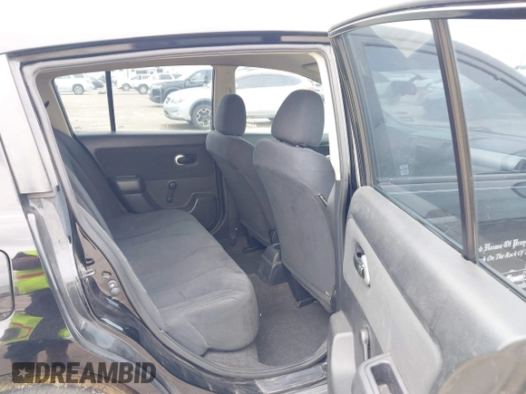 2009 Nissan Versa 1.8 SL with VIN 3N1BC13E79L393141, listed as a IAAI auction lot 42124776 with 233,137 mi miles. Bid and sale history available at carsss.com. Image 8.