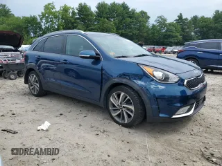 2019 Kia Niro Touring with VIN KNDCE3LCXK5345712, listed as a Copart auction lot 61921284 with 57,903 mi miles and Salvage Title. Bid and sale history available at carsss.com. Image 4.
