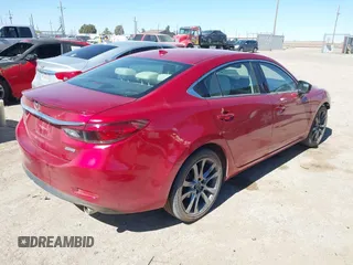 2017 Mazda 6 Grand Touring with VIN JM1GL1W52H1139776, listed as a IAAI auction lot 41671005 with 40,884 mi miles and . Bid and sale history available at DreamBid. Image 4.