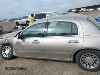 2001 Lincoln Town Car Signature with VIN 1LNHM82W21Y684197, listed as a IAAI auction lot 41944429 with 159,297 mi miles and . Bid and sale history available at DreamBid. Image 14.
