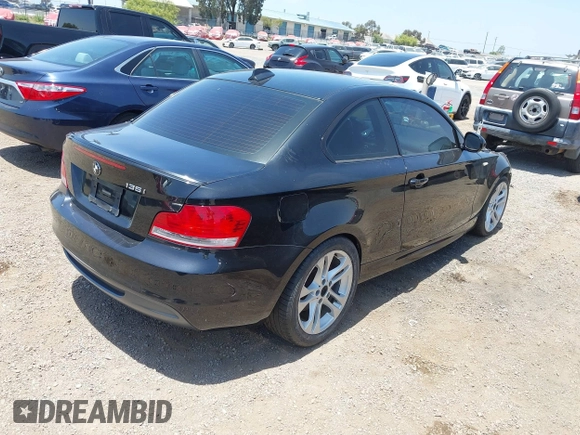 2010 BMW 1 Series 135i with VIN WBAUC7C54AVK80967, listed as a IAAI auction lot 42553077 with Not provided miles and . Bid and sale history available at DreamBid. Image 4.