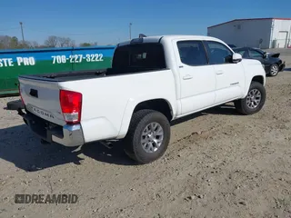 2017 Toyota Tacoma SR5 with VIN 5TFAZ5CN8HX044250, listed as a IAAI auction lot 41848524 with 53,379 mi miles and . Bid and sale history available at DreamBid. Image 4.