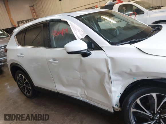 2023 Mazda CX-5 2.5 S Premium Plus Package with VIN JM3KFBEM5P0258952, listed as a IAAI auction lot 41509174 with 24,712 mi miles. Bid and sale history available at carsss.com. Image 13.