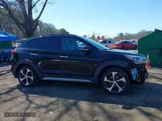 2018 Hyundai Tucson Value with VIN KM8J3CA26JU713729, listed as a IAAI auction lot 41950946 with 73,456 mi miles. Bid and sale history available at carsss.com. Image 14.