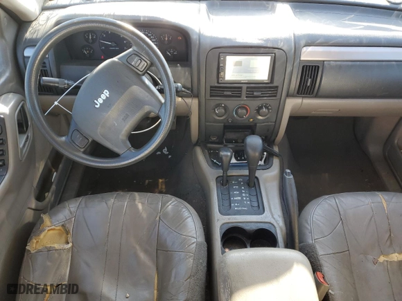 2004 Jeep Grand Cherokee Laredo with VIN 1J4GW48S44C325808, listed as a Copart auction lot 89351575 with 312,011 mi miles and Salvage Title. Bid and sale history available at carsss.com. Image 8.