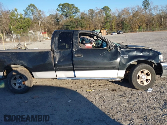 2003 Ford F-150 XL with VIN 1FTRX17W73NA09918, listed as a IAAI auction lot 41296725 with 1 mi miles. Bid and sale history available at carsss.com. Image 12.