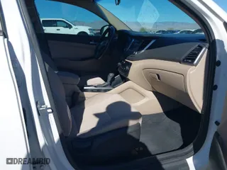 2016 Hyundai Tucson Limited with VIN KM8J33A25GU073747, listed as a IAAI auction lot 41317818 with 106,502 mi miles. Bid and sale history available at carsss.com. Image 5.
