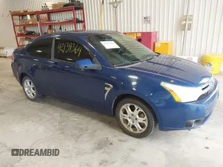 2008 Ford Focus SE with VIN 1FAHP33NX8W133127, listed as a IAAI auction lot 42139364 with 193,882 mi miles. Bid and sale history available at carsss.com. Image 1.