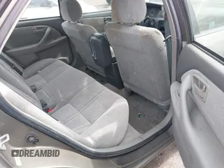 1998 Toyota Camry LE z VIN 4T1BF22K2WU042166, wystawiony jako IAAI lot #42416930 z przebiegiem 124 809 mil mil oraz . Historia ofert i sprzedaży dostępna na DreamBid. Obrazek 8.