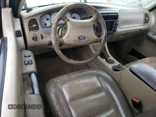 2003 Ford Explorer Sport XLS z VIN 1FMYU60EX3UB96754, wystawiony jako Copart lot #71924874 z przebiegiem 251 869 mil mil oraz Szkody całkowita. Historia ofert i sprzedaży dostępna na DreamBid. Obrazek 8.