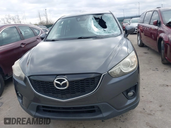 2015 Mazda CX-5 Grand Touring with VIN JM3KE4DY0F0479229, listed as a IAAI auction lot 41838381 with 139,843 mi miles. Bid and sale history available at carsss.com. Image 12.