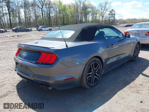 2023 Ford Mustang GT Premium with VIN 1FATP8FF9P5104802, listed as a IAAI auction lot 42033658 with 38,610 mi miles and . Bid and sale history available at carsss.com. Image 4.