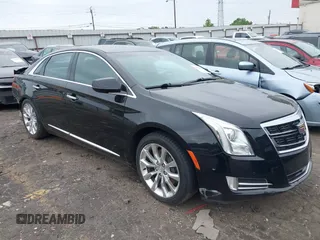 2017 Cadillac XTS Luxury z VIN 2G61M5S32H9106273, wystawiony jako IAAI lot #42134400 z przebiegiem Nie podano mil oraz . Historia ofert i sprzedaży dostępna na DreamBid. Obrazek 1.