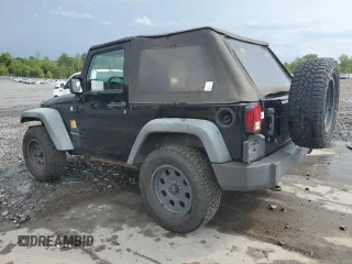 2011 Jeep Wrangler Sport z VIN 1J4GA2D16BL511735, wystawiony jako Copart lot #63292705 z przebiegiem 136 609 mil mil oraz Szkoda całkowita • Salvage title. Historia ofert i sprzedaży dostępna na DreamBid. Obrazek 2.