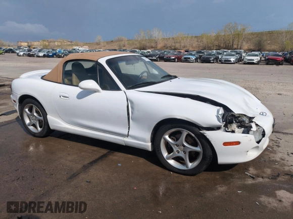 2002 Mazda MX-5 Miata Cloth z VIN JM1NB353X20229549, wystawiony jako Copart lot #54549205 z przebiegiem 79 871 mil mil oraz Szkoda całkowita • Salvage title. Historia ofert i sprzedaży dostępna na DreamBid. Obrazek 4.