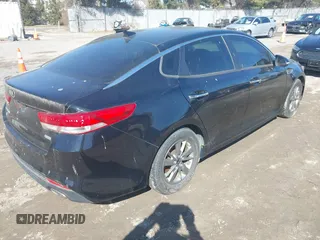 2016 Kia Optima LX Turbo with VIN 5XXGT4L18GG029739, listed as a IAAI auction lot 41496052 with 122,181 mi miles. Bid and sale history available at carsss.com. Image 4.
