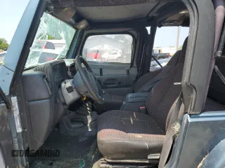 1999 Jeep Wrangler SE with VIN 1J4FY29P0XP422425, listed as a Copart auction lot 60513335 with Not provided miles and Clean title. Bid and sale history available at DreamBid. Image 7.