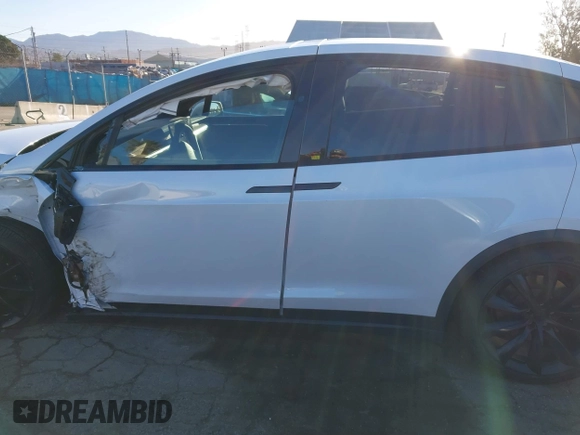 2022 Tesla Model X with VIN 7SAXCBE59NF364984, listed as a IAAI auction lot 41809256 with Not Provided miles and . Bid and sale history available at DreamBid. Image 15.