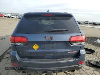 2021 Jeep Grand Cherokee Trailhawk with VIN 1C4RJFLG0MC525273, listed as a Copart auction lot 49632275 with 57,452 mi miles and Salvage title. Bid and sale history available at DreamBid. Image 6.