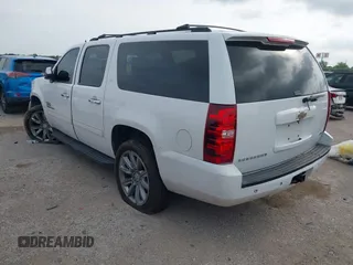2011 Chevrolet Suburban LT with VIN 1GNSCJE05BR392834, listed as a IAAI auction lot 42141087 with 251,359 mi miles and . Bid and sale history available at DreamBid. Image 3.