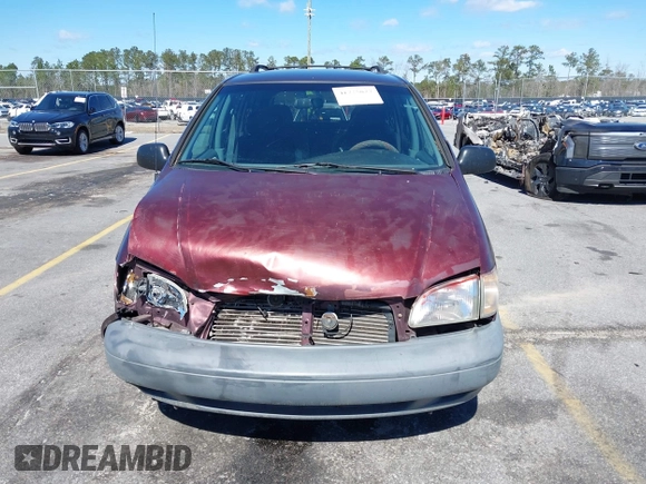 1999 Toyota Sienna LE with VIN 4T3ZF13C1XU112717, listed as a IAAI auction lot 41725827 with 272,639 mi miles. Bid and sale history available at carsss.com. Image 12.