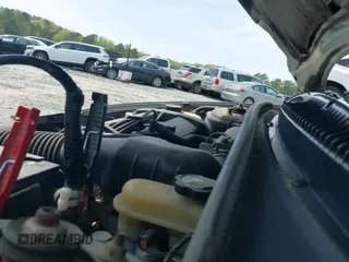 1999 Saturn SL z VIN 1G8ZK5275XZ165082, wystawiony jako IAAI lot #41939970 z przebiegiem 102 694 mil mil oraz . Historia ofert i sprzedaży dostępna na DreamBid. Obrazek 13.