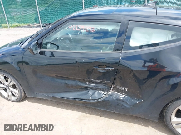 2013 Hyundai Veloster w/Black Int с VIN KMHTC6AD5DU084996, выставлен на аукционе IAAI как лот 42279292 с пробегом 179 460 миль миль и . История ставок и продаж доступна на DreamBid. Изображение 6.