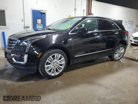2018 Cadillac XT5 Premium Luxury AWD with VIN 1GYKNFRS7JZ104736, listed as a Copart auction lot 52029565 with 80,263 mi miles and Salvage title. Bid and sale history available at DreamBid. Image 1.