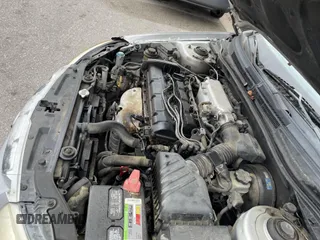 2004 Kia Spectra LX with VIN KNAFE121845043143, listed as a IAAI auction lot 41574523 with 211,758 mi miles. Bid and sale history available at carsss.com. Image 10.