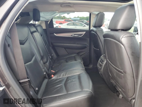 2019 Cadillac XT5 Luxury AWD z VIN 1GYKNDRS9KZ115887, wystawiony jako Copart lot #58528075 z przebiegiem 75 651 mil mil oraz Szkoda całkowita • Salvage title. Historia ofert i sprzedaży dostępna na DreamBid. Obrazek 11.