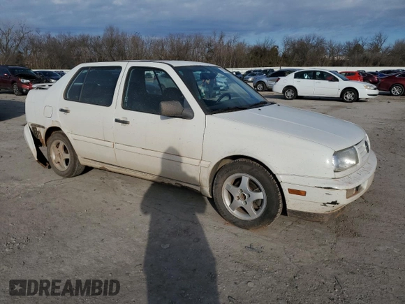 1998 Volkswagen Jetta z VIN 3VWVA81H4WM127083, wystawiony jako Copart lot #88396925 z przebiegiem 192 757 mil mil oraz Szkoda całkowita • Salvage title. Historia ofert i sprzedaży dostępna na DreamBid. Obrazek 4.
