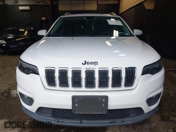 2019 Jeep Cherokee Latitude Plus with VIN 1C4PJMLX4KD232091, listed as a IAAI auction lot 41524058 with 59,196 mi miles and . Bid and sale history available at DreamBid. Image 12.